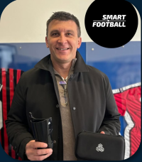 Sergej Jakirović holding INSAIT JOY Smart Shinguards